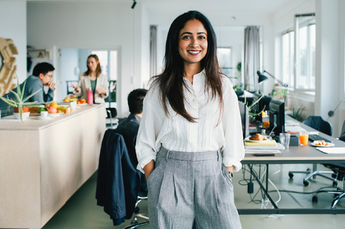 1461612327-Hero Portrait Hands in pockets at office-1