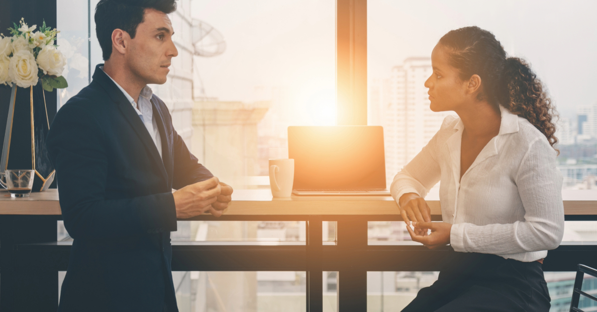 Diverse business people having conversation during coffee break time with laptop computer and cup of coffee at  office.