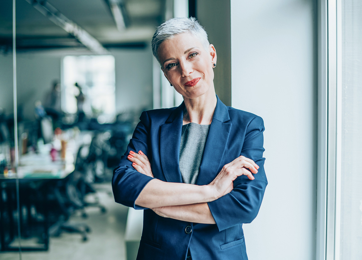 GettyImages-1180554590-Businesswoman with arms crossed looking at camera