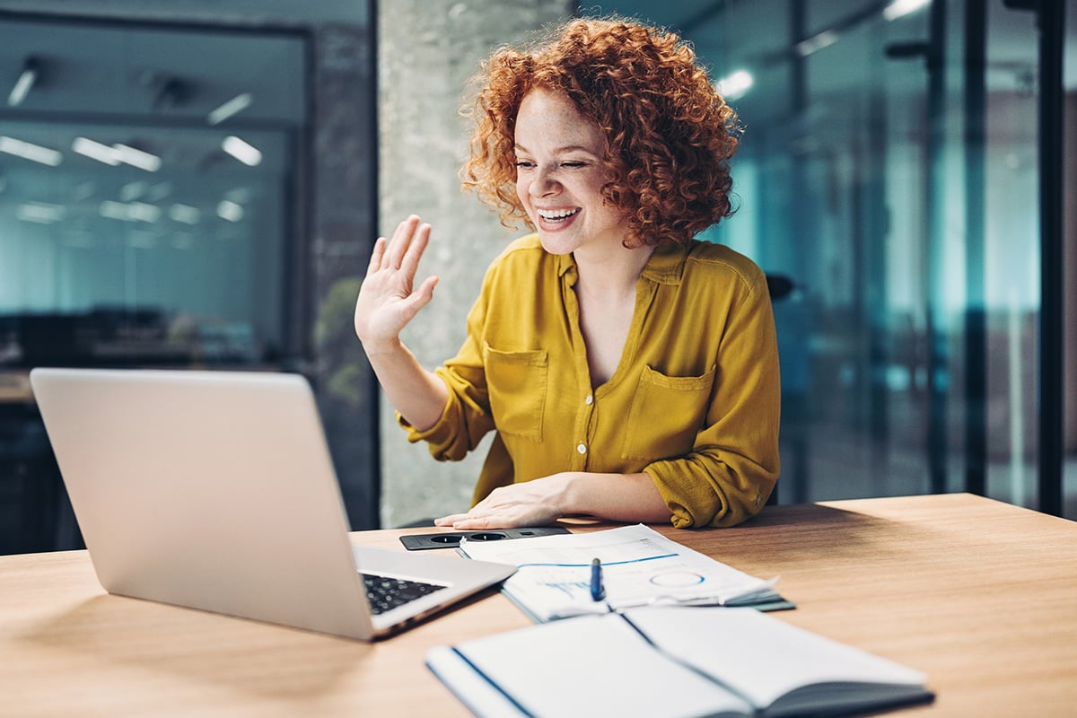 GettyImages-1353281849-Young woman starting a video conference