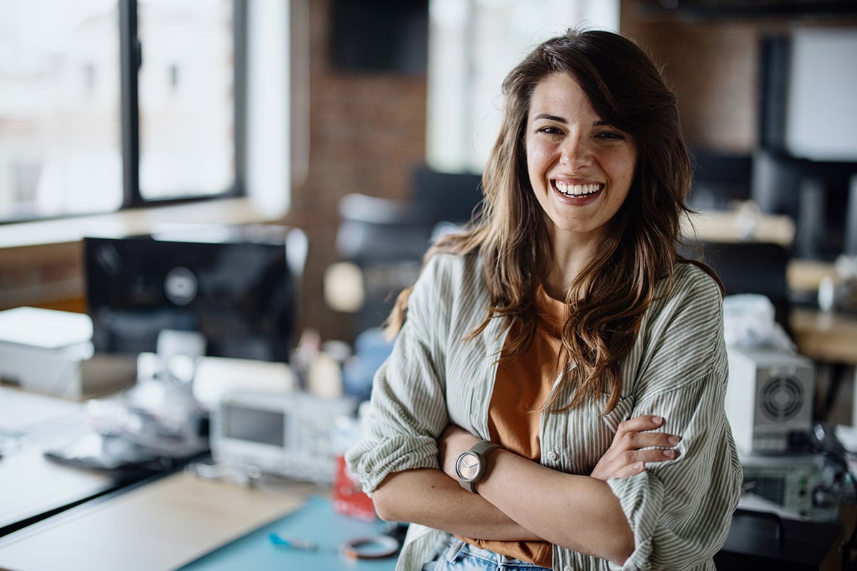 GettyImages-1401723410-Portrait of confident female entrepreneur at creative office