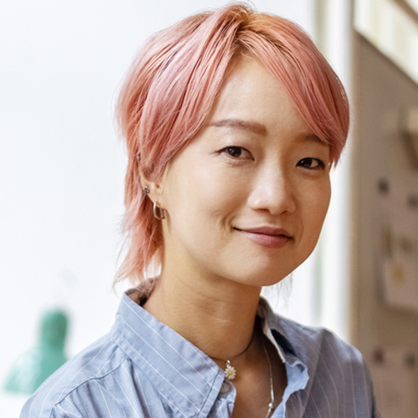 GettyImages-1437209106-Portrait of confident creative businesswoman smiling in office