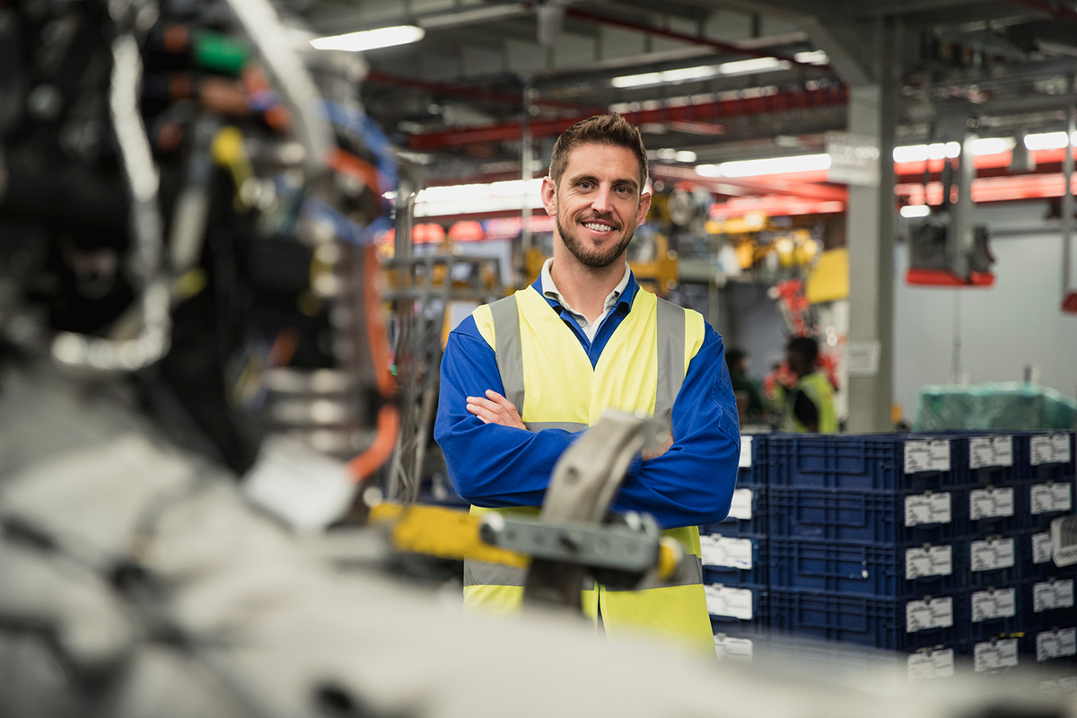 GettyImages-861222248-Portrait of a production line worker.