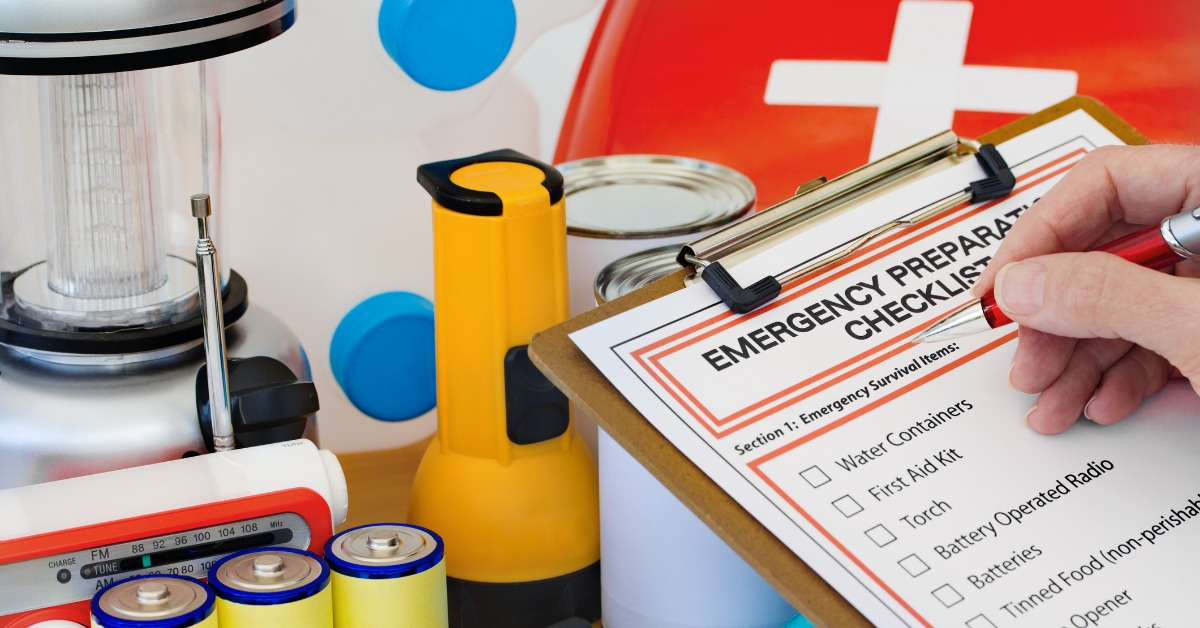 workplace emergency, image of emergency preparedness checklist with flashlight, lantern, batteries, water, and first aid kit
